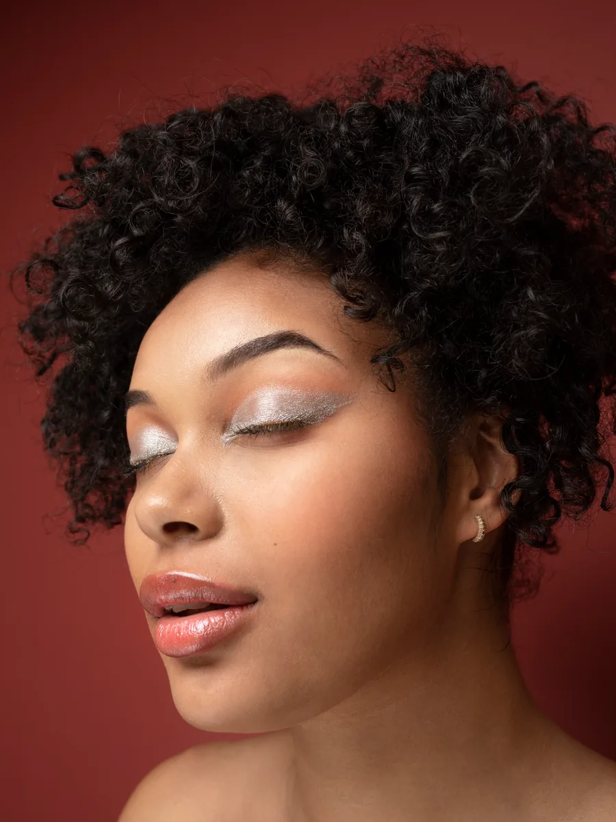 Editorial beauty portrait with luminous makeup